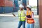 Male and female manager discuss and checking about their job for shipment to customer. Distribution storage commerce port cargo