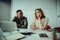 Male and female partners brainstorming ideas for new business discussing project plans in board room during team meeting