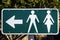 Male and female toilet directions sign