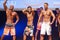 Male fitness models show their physique in swimsuit om stage