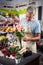 Male florist arranging flowers