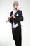 Male flutist wearing tailcoat holds flute