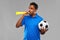 Male football fan with soccer ball and vuvuzela