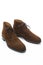 Male Footwear Ideas. Closeup of Pair of Mens Brown Suede Chukka Boots Against White Background