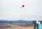 Male freestyle skier flying through the air during a practice jump