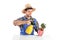 A male gardener watering a bonsai tree