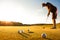 Male golf player practicing a par during sunset