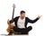 Male guitarist sitting on the floor and pointing