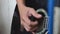 Male Guitarist strumming guitar. close up, shallow depth of field