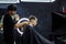 Male haircut with electric razor. Barber makes haircut for client at the barber shop by using hairclipper. Man
