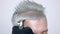 Male haircut with electric razor. Close up of man hair cut. Male hands barber shaving man with electric razor in