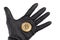 Male hand in black glove holds golden bitcoin in open hand isolated on white. Crime and cryptocurrency concept.