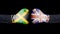 Male hand in Boxing gloves with Jamaica and British flags. Jamaica versus UK concept.