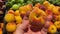Male hand chooses peaches on a local farmer organic market. Vegan food market.