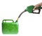 Male hand filling fuel in a green canister