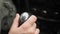 Male hand on gear lever, manual transmission.
