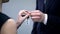 Male hand giving lady keys to Solution, help in solving business problem closeup