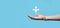 Male hand holding icon with three directions icon on blue background. Doubt, having to choose between three different choices