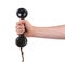 Male hand holding retro landline telephone