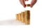 Male hand picking Euro Coins piled in stacks