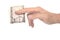Male hand pinching dollar note