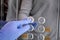 Male hand in protective glove virus coronavirus presses button lift