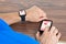 Male hand with smartwatch and cellphone