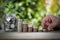 Male hand stack coins and layer to show keep money step and money in a jar with tree on top.