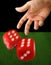 Male Hand Throwing Dice