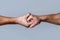 Male hand united in handshake. Man help hands, guardianship, protection. Two hands, isolated arm, helping hand of a