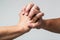 Male hand united in handshake. Man help hands, guardianship, protection. Two hands, isolated arm, helping hand of a