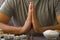 Male hands in an attitude of gratitude or prayer. Relaxed atmosphere for the practice of meditation or yoga