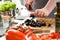 Male Hands Chopping Round Black Olives Slices