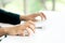 Male Hands Clicking Wireless Computer Mouse Laptop computer on Office Table