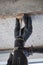 Male hands of  construction worker drills  hole in concrete with  hand drill. the process of drilling holes in concrete beams and