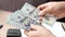 Male hands counting dollars banknotes