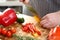 Male Hands Cutting Yellow Chili Salad Ingredient