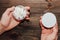 Male hands hold in hand a box of snus with nicotine spiders.