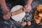 Male hands kneading dough sprinkled with flour table, Hands prep