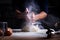 Male hands making dough for pizza, dumplings or bread. Baking concept