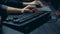 Male hands operating an illuminated keyboard in a close up