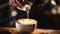 male hands pouring milk and preparing fresh cappuccino