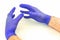 Male hands with purple rubber gloves