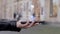 Male hands show on smartphone conceptual HUD hologram gun