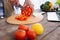 Male hands slicing bell pepper