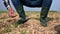 Male hands touching soil on the field. Expert hand of farmer checking soil health before growth a seed of vegetable or