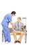 Male healthcare professional assisting a senior gentleman seated