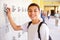 Male High School Student Opening Locker