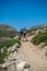 male hiker walking on Besseggen ridge in Jotunheimen National