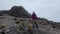 A male hiker walks in a mountainous area. Mountain landscape. Climbing Kilimanjaro